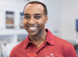 Dr. Corey L. Hartman